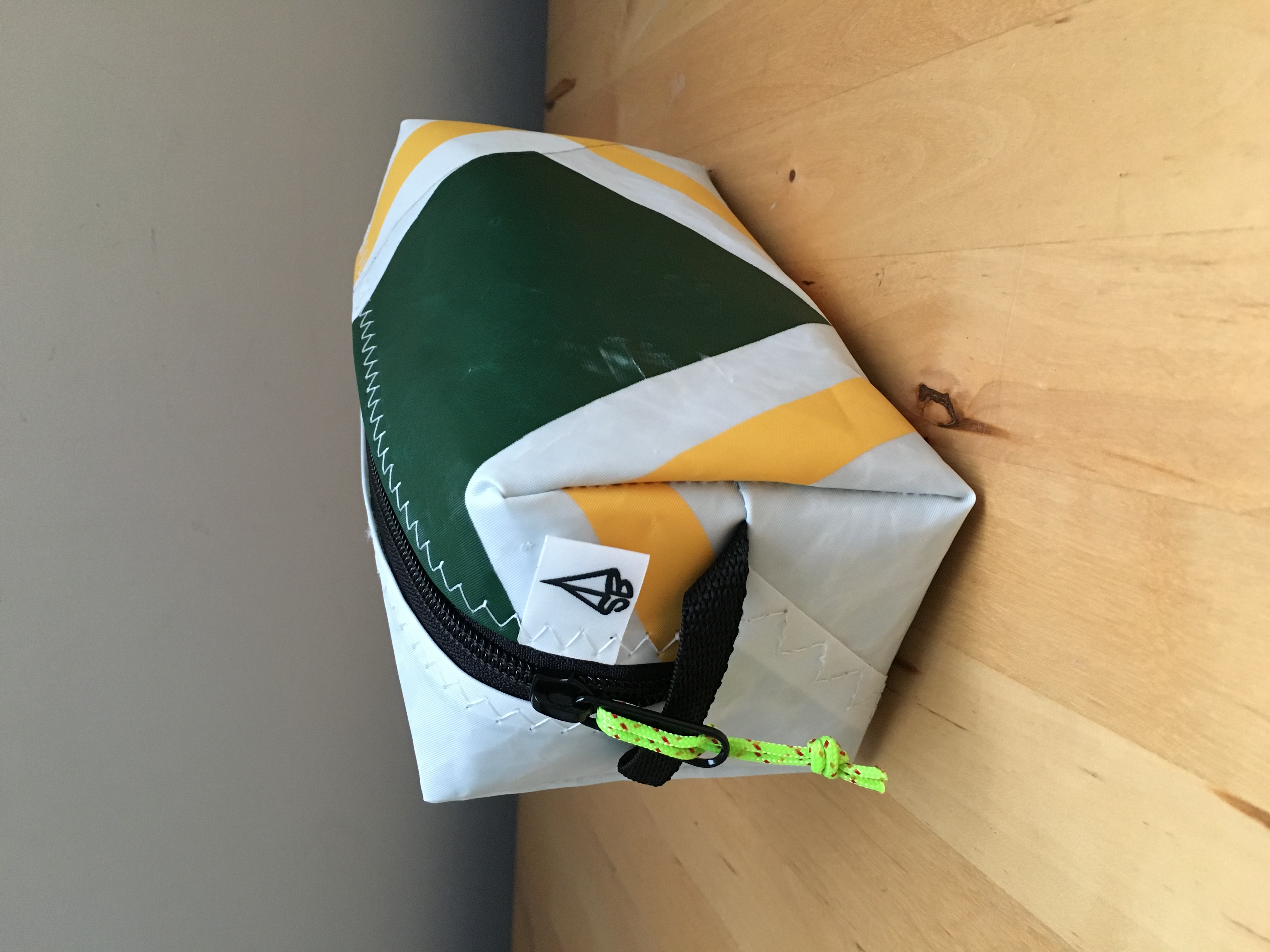 Green and gold dopp kit
