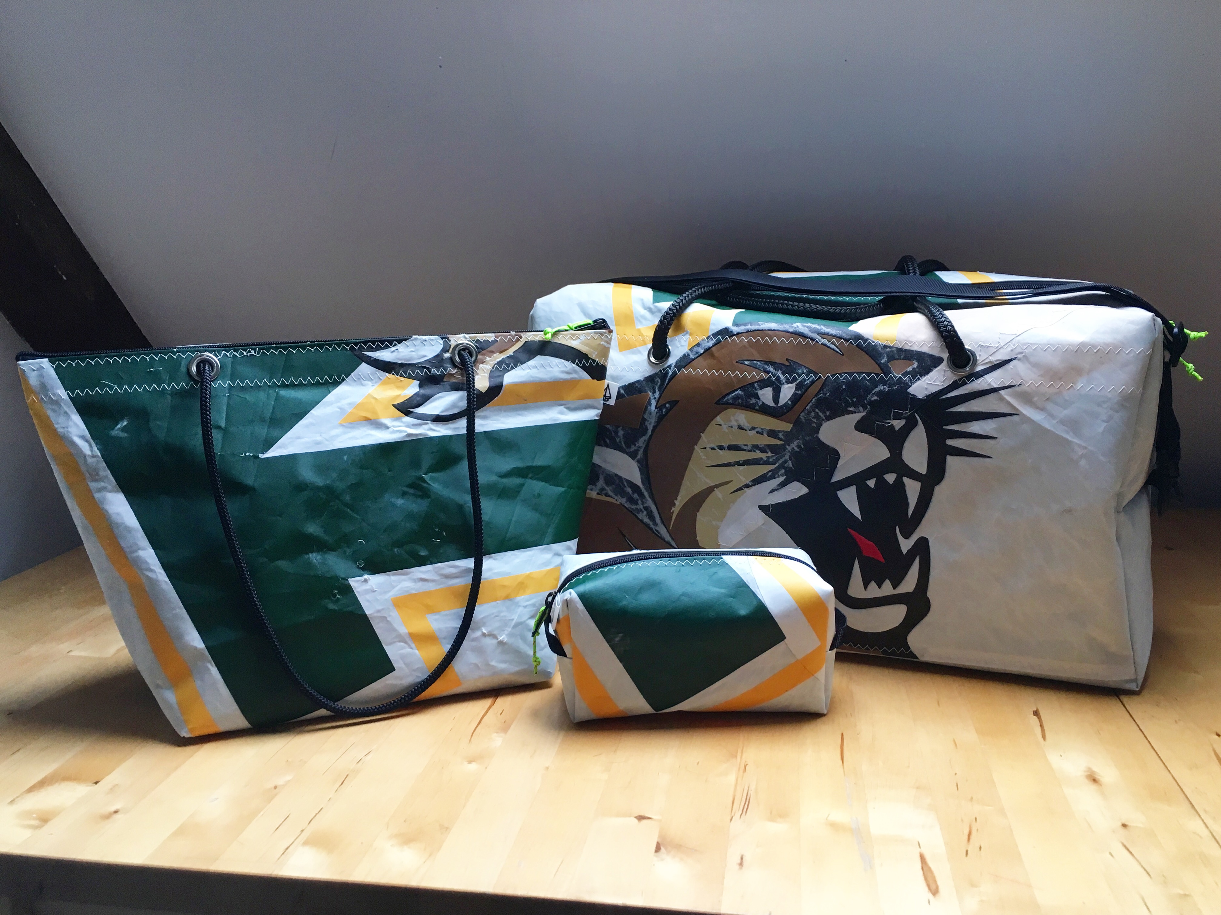 Matching tote, duffel and dopp kit set