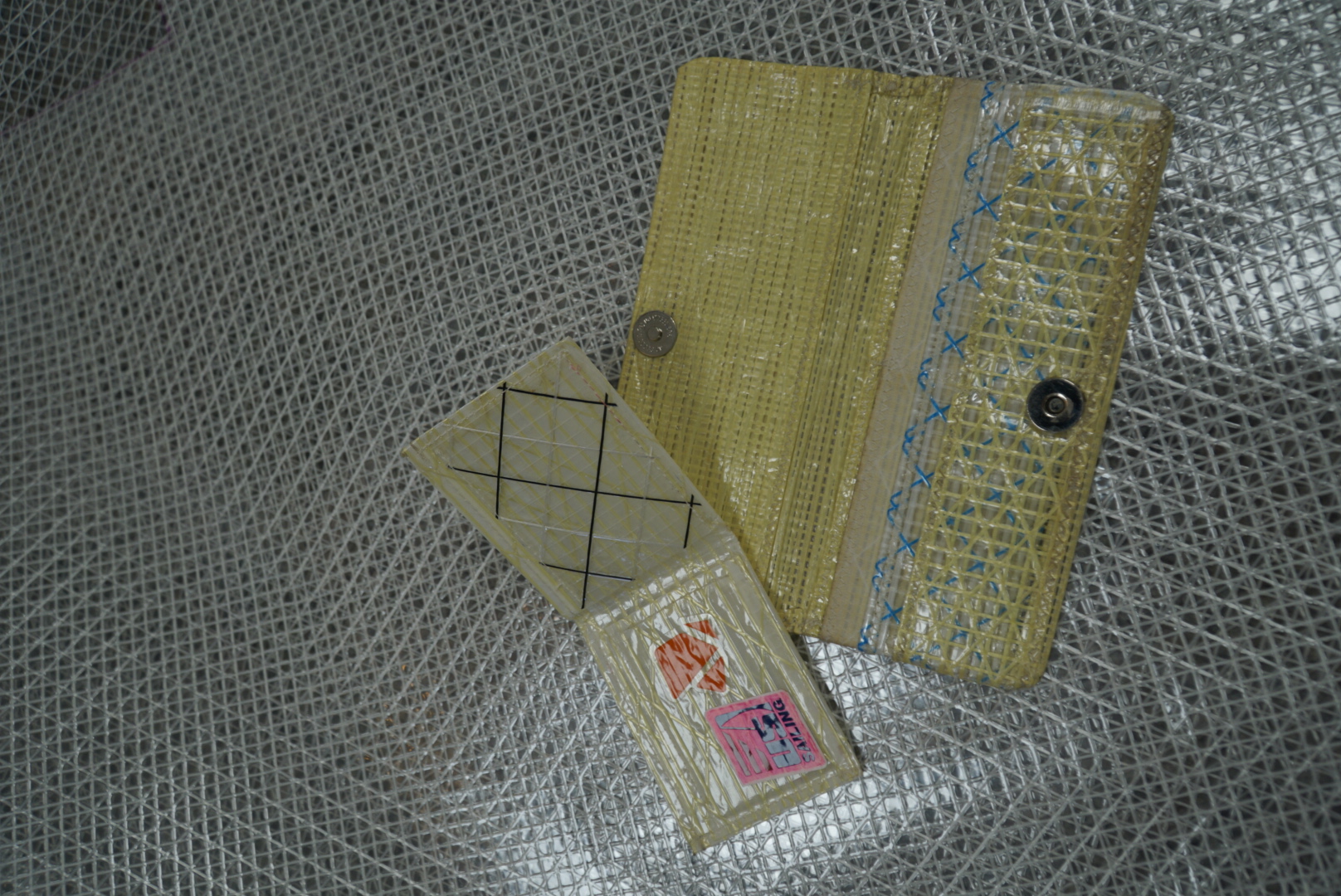 Sailcloth wallets on scrim